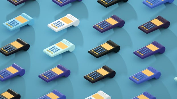 Pattern of colorful calculators on a blue background representing design and finance.